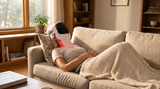 Lying back on the sofa during a cordless session with the Moranoir LED mask